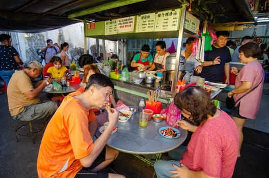 Bukit Mertajam, Penang/Malaysia - Jan 05 2020: People enjoy delicious food at outdoor.