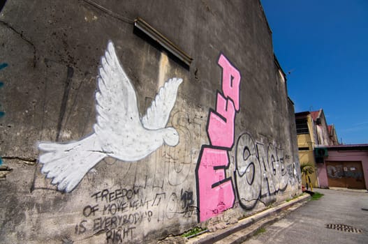 George Town, Penang/Malaysia - Nov 11 2019: Street art pigeon fly.