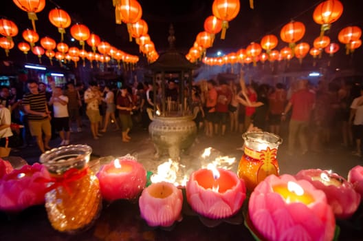 Georgetown, Penang/Malaysia - Jan 24 2020: People pray with joss stick and candle.