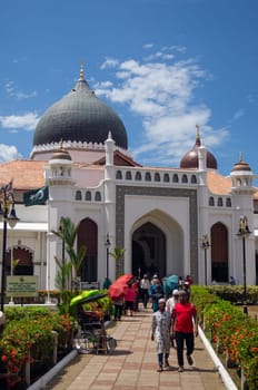 Georgetown, Penang/Malaysia - Feb 14 2020: Muslim come out from Kapitan Keling Mosque after friday pray.