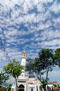 Georgetown, Penang/Malaysia - Feb 14 2020: Minaret Kapitan Keling Mosque under blue sky.