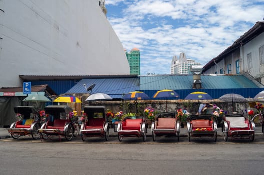 Georgetown, Penang/Malaysia - Feb 14 2020: Rickshaw in a row at Penang Road.