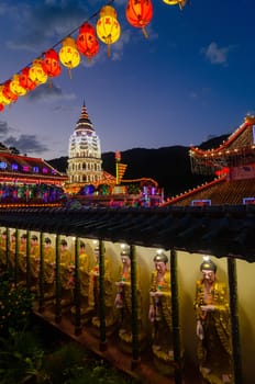 Georgetown, Penang/Malaysia - Feb 20 2020: Buddha statue, Pagoda, lantern during blue hour at Kek Lok Si.