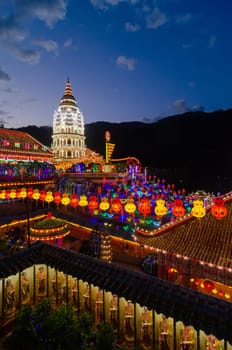Georgetown, Penang/Malaysia - Feb 20 2020: Pagoda with Buddha statue at Kek Lok Si during blue hour.