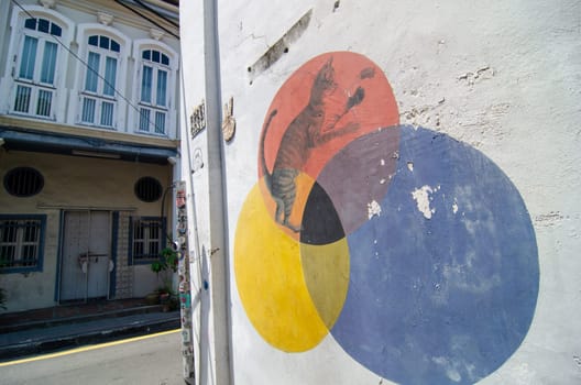 Georgetown, Penang/Malaysia - Feb 27 2020: Mural art cat in 3 circle color.
