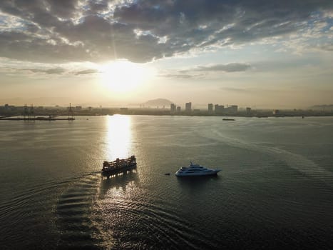 Georgetown, Penang/Malaysia - Feb 28 2020: Silhouette Penang ferry move in sunny morning.