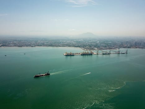 Georgetown, Penang/Malaysia - Feb 28 2020: Aerial container ship leave terminal.