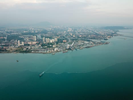 Georgetown, Penang/Malaysia - Feb 28 2020: Aerial top view ferry sail at sea.