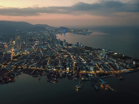 Georgetown, Penang/Malaysia - Feb 28 2020: Ferry terminal and penang Georgetown at night.