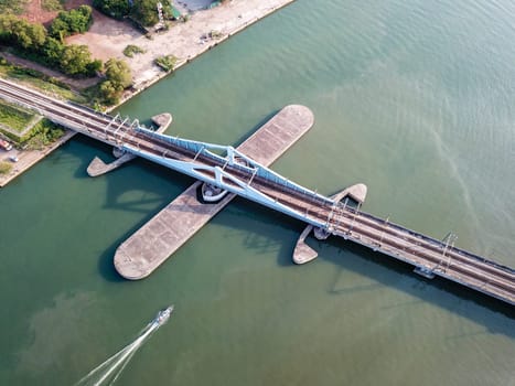 Perai, Penang/Malaysia - Mar 02 2020: Aerial view boat move at Prai River Swing Bridge.