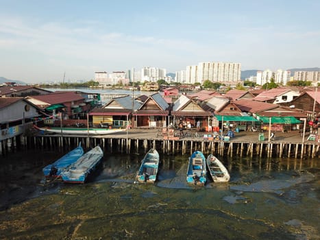 Georgetown, Penang/Malaysia - Feb 28 2020: Chew Jetty wooden bridge and house on water.