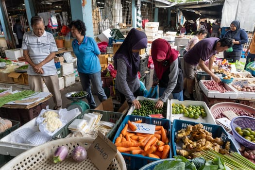 Bukit Mertajam, Penang/Malaysia - Mar 08 2020: Local buy vegetables at morning market.