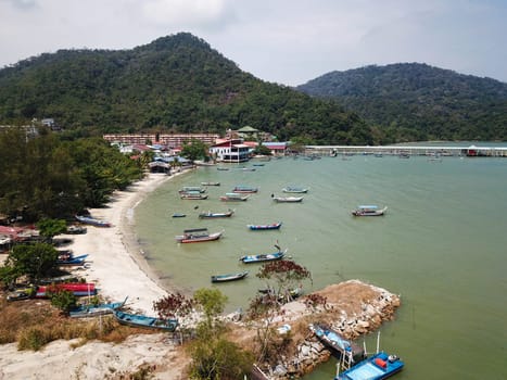 Teluk Bahang, Penang/Malaysia - Mar 08 2020: Boat park at coastal seashore Teluk Bahang.