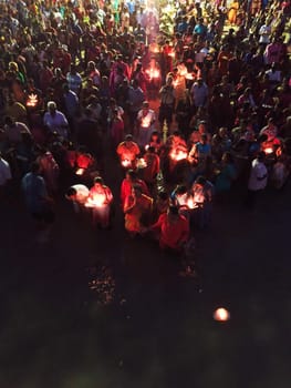 Teluk Bahang, Penang/Malaysia - Mar 08 2020: Devotees release lamp to sea at Sri Singamuga Kaliamman Temple
