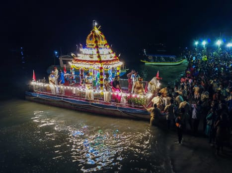 Teluk Bahang, Penang/Malaysia - Mar 08 2020: Floating chariot return to beach during festival at Sri Singamuga Kaliamman Temple