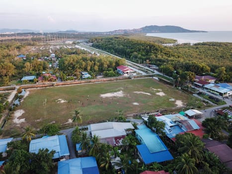 Bukit Mertajam, Penang/Malaysia - Mar 11 2020: Aerial view football field at Malays village.