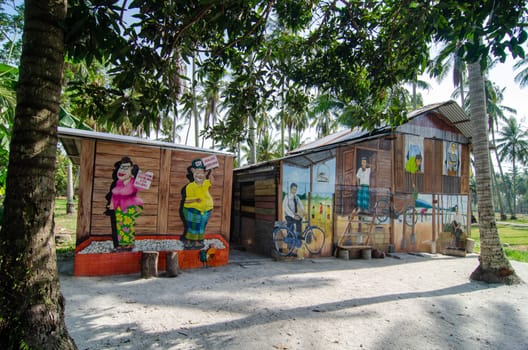 Penaga, Penang/Malaysia - Mar 15 2020: Malays Mural at wooden kampung house.