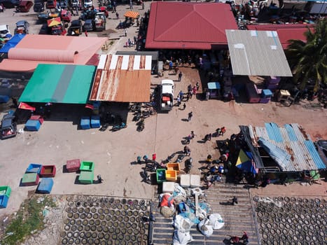 Penaga, Penang/Malaysia - Mar 14 2020: Busy people buy seafood at jetty.