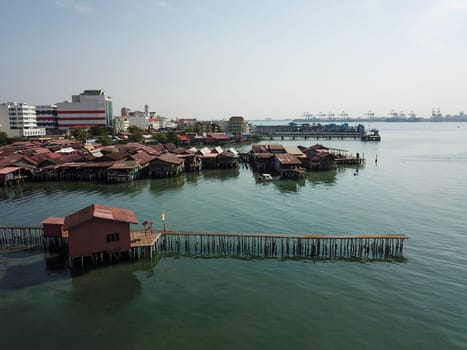 Georgetown, Penang/Malaysia - Mar 17 2020: Drone view clan jetty wooden bridge.