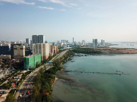 Georgetown, Penang/Malaysia - Mar 17 2020: Aerial view coastal at Jelutong in morning.