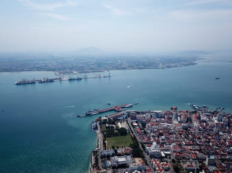 Georgetown, Penang/Malaysia - Mar 17 2020: Aerial view boat move at Penang sea.