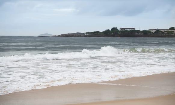 Ocean surf on the beach of Copacabana. Rio de Janeiro, February 2020