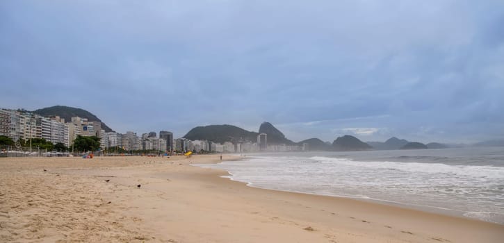 Ocean surf on the beach of Copacabana. Rio de Janeiro, February 2020
