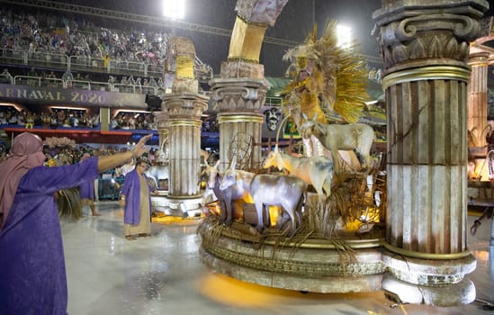 Rio de Janeiro, Brasil-  February 29, 2020: Samba Parade at the 2020 Carnival Champions Parade, Sambodromo. It's raining