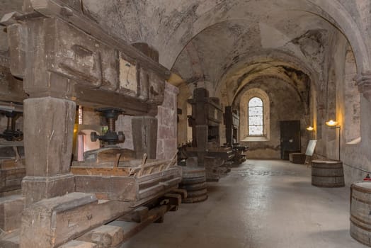 historical wine presses in the lay refectory of the Eberbach monastery, Hessen, Germany
