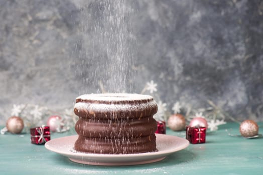Traditional german christmas chocolate cake called Baumkuchen, winter season sweets