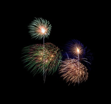Colorful exploded fireworks display, isolated on black background
