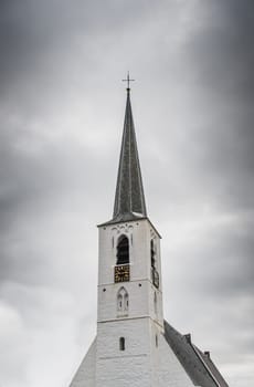 White church in Noordwijkerhout in the Netherlands with cloudy sky