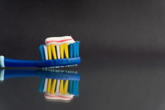 Toothbrush closeup on white background. Healthy concept