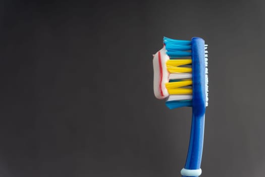 Toothbrush closeup on white background. Healthy concept