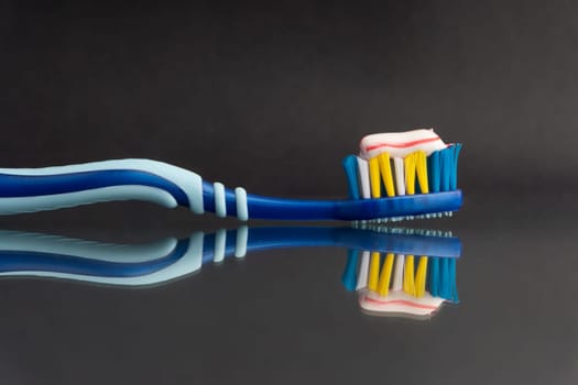 Toothbrush closeup on white background. Healthy concept