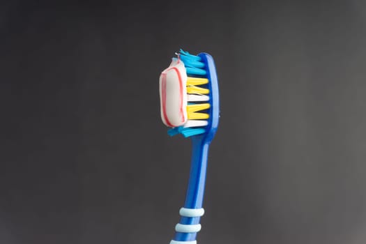 Toothbrush closeup on white background. Healthy concept