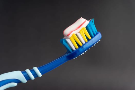 Toothbrush closeup on white background. Healthy concept