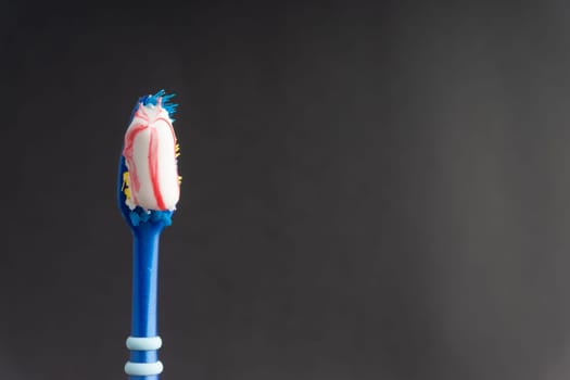 Toothbrush closeup on white background. Healthy concept