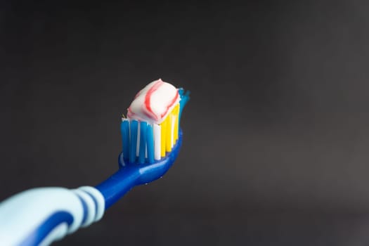 Toothbrush closeup on white background. Healthy concept