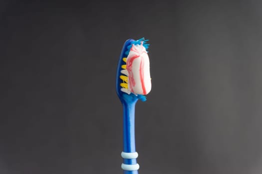 Toothbrush closeup on white background. Healthy concept