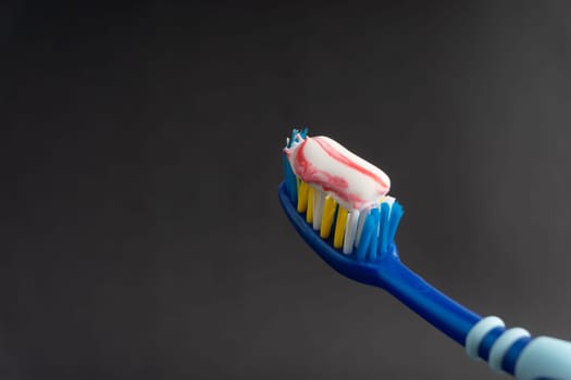 Toothbrush closeup on white background. Healthy concept