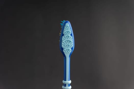 Toothbrush closeup on white background. Healthy concept