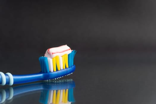 Toothbrush closeup on white background. Healthy concept