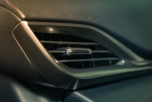 Modern Car Air Vent in Car Interior on Zoom View in Vintage Tone