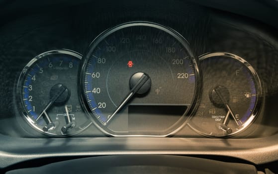 Car Dashboard on Car Console and Door Open Signal and Speed Dial in Vintage Tone
