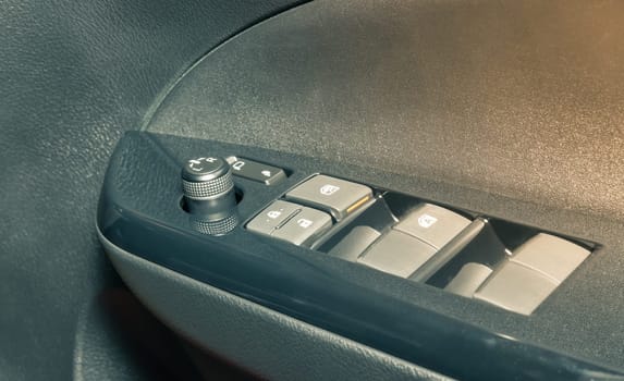 Side Mirror Control Switch of Car or Automobile in Zoom View in Vintage Tone