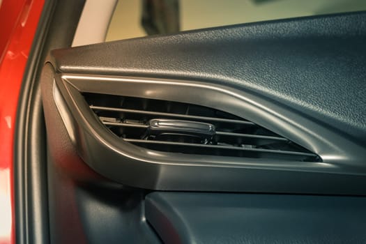 Front Modern Car Air Vent in Car Interior on Zoom View in Vintage Tone