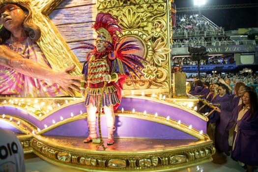 Rio de Janeiro, Brasil-  February 29, 2020: Samba Parade at the 2020 Carnival Champions Parade, Sambodromo. It's raining