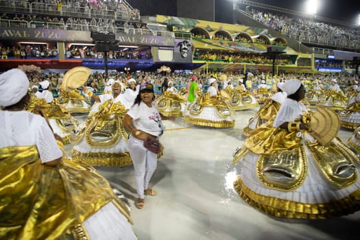 Rio de Janeiro, Brasil-  February 29, 2020: Samba Parade at the 2020 Carnival Champions Parade, Sambodromo. It's raining