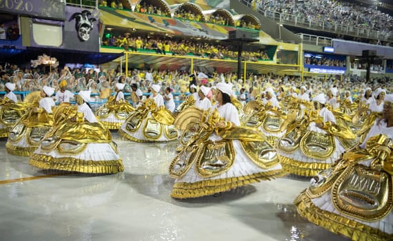 Rio de Janeiro, Brasil-  February 29, 2020: Samba Parade at the 2020 Carnival Champions Parade, Sambodromo. It's raining